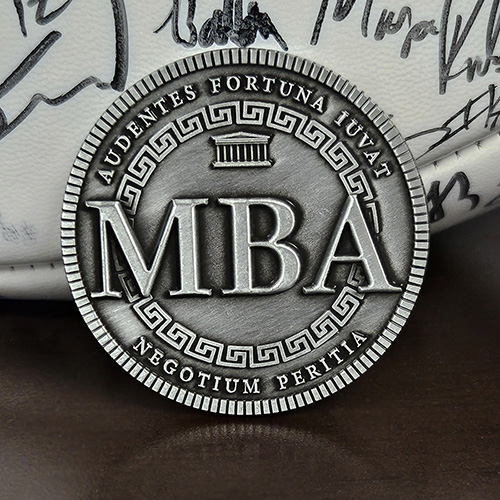 Doctorum's Exclusive MBA Coin Doctorum's MBA Coin. This is indeed a remarkable tribute and an exceptional gift for the MBA in your life. Whether celebrating a new MBA program graduate or honoring the seasoned MBA, this unique creation is sure to make a lasting impression.