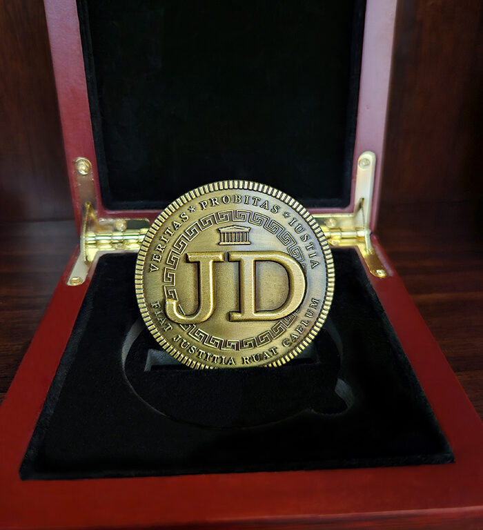 Doctorum's JD Coin is truly remarkable tribute and an exceptional gift for the JD in your life. Whether celebrating a new law school graduate or honoring a seasoned legal eagle, this unique creation is sure to make a lasting impression.